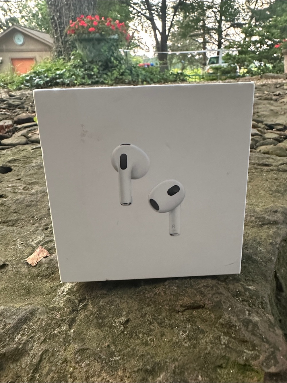 Apple AirPods 3rd generation box and charging case.